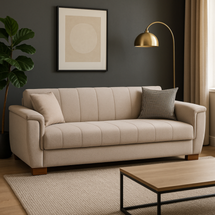 كنبة 3 في 1: كنبة، سرير، وسحّارة تخزين. الأبعاد والقياسات الأبعاد الكلية: 230 سم (طول) × 82 سم (عرض). عمق مقعد الكرسي: 77 سم. أبعاد السرير: 122 سم × 192 سم. أبعاد السحّارة: 192 سم (طول) × 52 سم (عرض) × 20 سم (ارتفاع). المواد والتصنيع الخشب: السحّارة: مصنوعة من أجود أنواع الخشب الكونتر الفنلندي مع قوائم من الخشب الموسكي، مما يجعلها قوية ومتحملة للأوزان المتوسطة. الآلية: مزودة بآلية تركيّة عالية الجودة لسهولة تحويلها إلى سرير. الشاسيه (القاعدة): شاسيه من الصلب المقوى (قطر السلك 2.0 ملم) معالج ضد الصدأ. نابض أوروبي مستورد ومُعالج ضد الصدأ، محاط بإطار من الصلب المتين (قطر 7 ملم). الشاسيه مدعّم بإطار من الخشب الموسكي لزيادة قوته وتحمله. إضافة طبقات من الإسفنج عالي الكثافة لزيادة قوة الشاسيه. الحشوات والطبقات: اللباد: طبقات من اللباد القوي المصنوع من الألياف الطبيعية لتوزيع الأوزان على الشاسيه، حماية الإسفنج من الاحتكاك، ومنع الشعور بالسوست نهائيًا. القطن: طبقات من القطن المصري المقوى (1570 جرام/م2) لزيادة تحمل الأوزان. الإسفنج: طبقات من الإسفنج السوبر سوفت لتوفير الراحة والاسترخاء. النسيج: قماش فاخر من القطن المصري عالي الجودة. مُبطّن بطبقة من الإسفنج السوبر سوفت، وطبقة من الفايبر الرول، وطبقة من الفازلين القوي لحماية الإسفنج. الوسائد: وسائد (كوشن) مصنوعة من قماش مُشجّر ومحشوة بفايبر هولو سوبر سوفت. الأرجل: أرجل بزاوية لزيادة الثبات والتحمل (ارتفاع 5 سم).